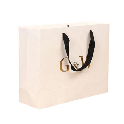 China Recyclable logo stamping white paper bag with ribbon rope for sale