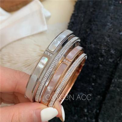 China New Fashionable Wholesale Shells Luxury Pave Crystal Zircon Gold Women Stainless Steel Bracelets Bangles Jewelry for sale