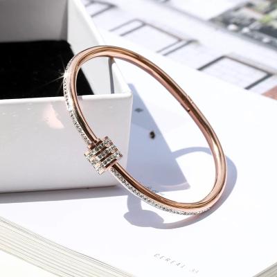 China Trendy Titanium Steel Gold Plated Designer Charm Jewelry Women Full Crystal Luxury Bangle for sale