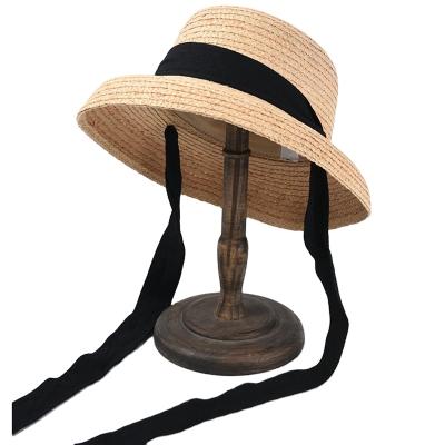 China Audrey Hepburn Eco-Friendly French Strapping Beach Vacation Seaside Raffia Straw Hat Sun Hat Female Hat Retro for sale