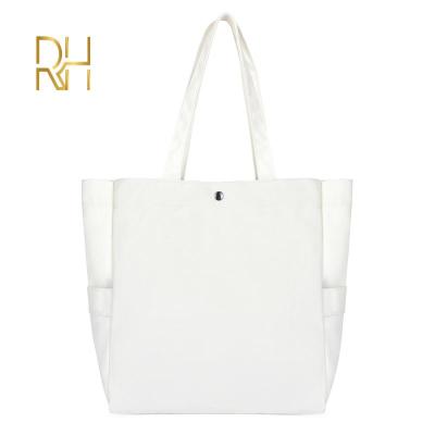 China OEM Fashion Canvas Shoulder Bag Material Youth Canvas Eco-Friendly Simple Lightweight Large Capacity Tote Bag Wholesale for sale