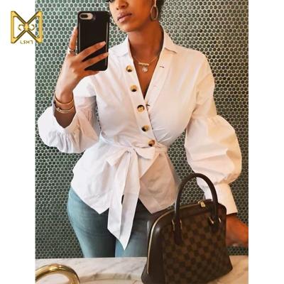 China 2020 V-neck sexy lantern long sleeve solid white blouse sexy button strap slim shirt white blouse for women for sale