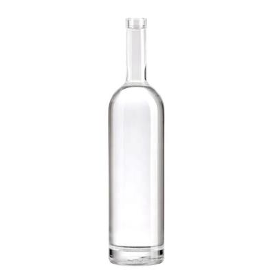 China Empty Beverage Cylinder Shape Transparent Glass Vodka 750ml Liquor Bottle With Cork for sale