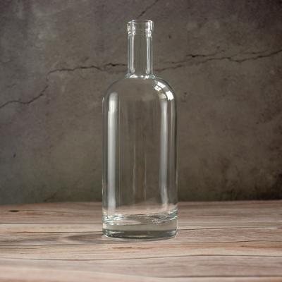 China Clear Beverage Flint 700ml 750ml Vodka Rum Gin Liquor Glass Bottle With Cork for sale