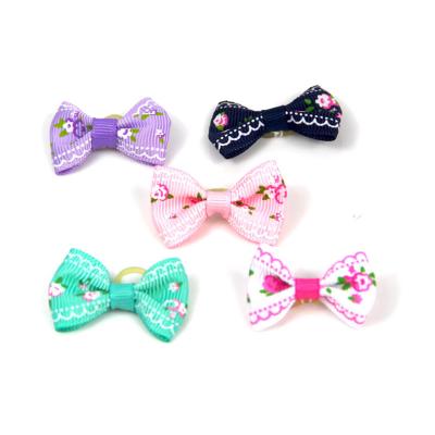 China Wholesales Pet Viable Concise Solid Small Size Rubber Hair Flower Bow For Dogs Cats for sale