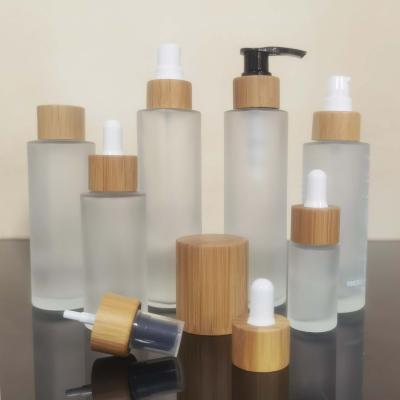 China Bamboo Lid Cosmetic Spray Lotion Jar Cap Skin Care Cosmetic Frosted Glass Wood Packaging Eco Friendly Bottle Cream Bottle for sale