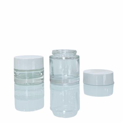 China Wall Mount Cosmetic Luxury Clear Thick Glass Cream Jar Heavy Face Cream Jar 15ml 50g With Gold Cap for sale