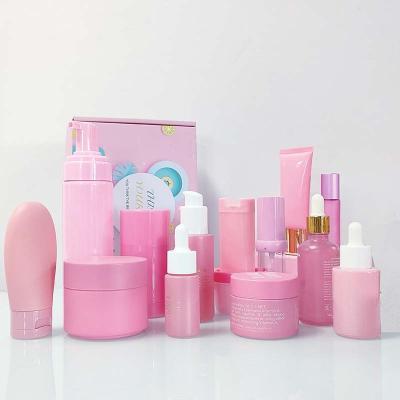 China Cosmetic Manufacturers Glass 60ML Cosmetic Toner Bottles And 10g Custom Pink Cream Jars Set Skin Care Bottle Face Cream Packaging Jars for sale