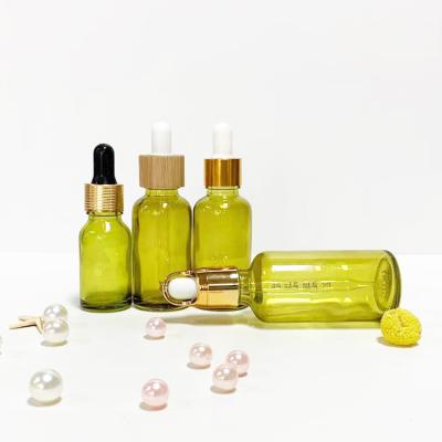 China Factory Supply Cosmetic Roller Bottles Essential Oil Green Amber Glass Dropper Bottle For Essential Oils Color 5ml for sale