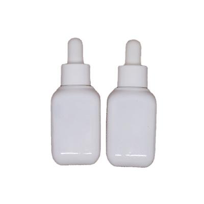 China Square Shaped White Ceramic Cosmetic Porcelain Serum Skin Care Dropper Glass Bottle For Liquid Makeup for sale