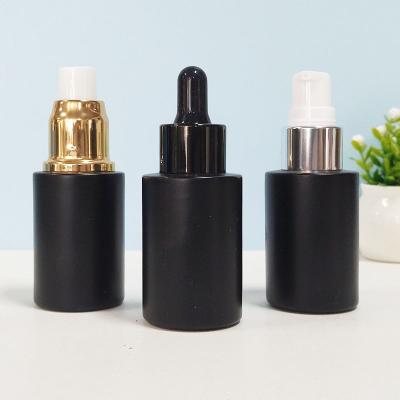 China Clear Black Glass Skin Care Lotion Bottle Cosmetic Luxury Matte Serum Liquid Bottles Frosted Cosmetic Packaging With Spray Pump for sale