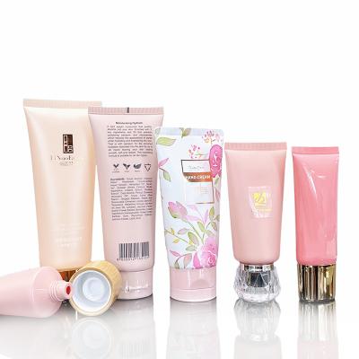 China Face Wash Custom Soft Plastic Cosmetic Squeeze Packaging Pink Tube For Eye Hand Body Lotion Base Cream Skin Care Sunscreen for sale