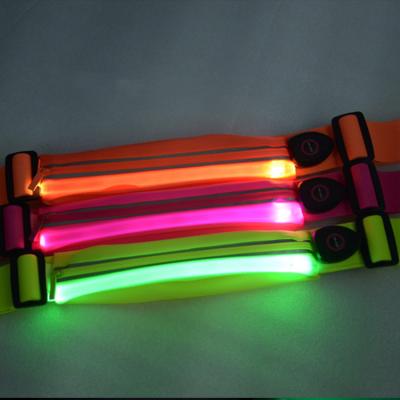 China waterproof soft lycra material mobile phone bag pussy pack waist bag running bag with LED light for night wear for sale