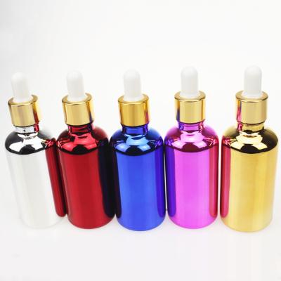 China Personal Care 30ml Gold Plating E Liquid Essential Oil Glass Bottle With Dropper for sale