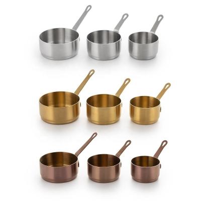 China Sustainable Stainless Steel Rose Gold Measuring Cups And Spoons Walnut Wood Handle For Measuring Cup for sale