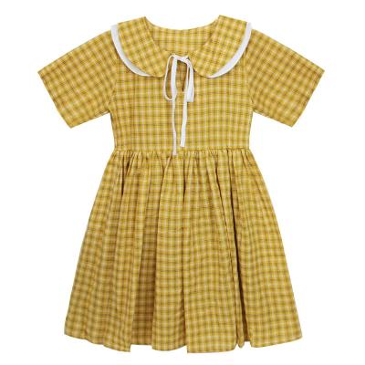 China Anti-wrinkle Children's Clothing Dealing Summer Custom Girls' Dress Large Size Short Sleeve Children Leisure Plaid Skirt for sale