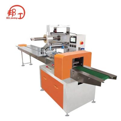 China New and beautiful automatic structure sanitary pads packaging machine tobacco packaging machine snack packaging machine for sale