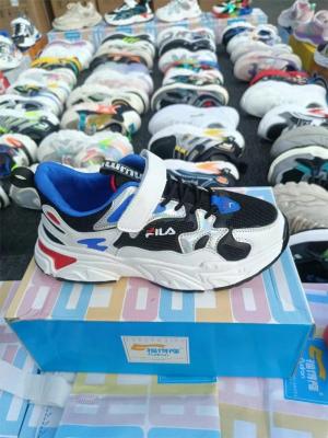 China Original Soccer Shoes New Design Stock Sports Kids Sports Shoes Made In China for sale