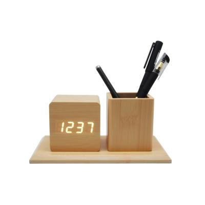 China Durable Time Temperature Voice Control Wake Up Shine Adjustment Pen Stand Wood Alarm Clock for sale