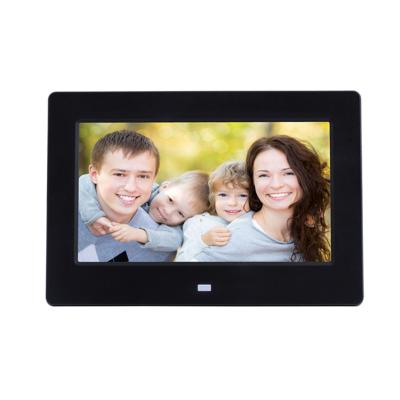 China Hot Selling 7 Inch Mini Digital Clock Playback Mode Slide Music Photo Frame for sale