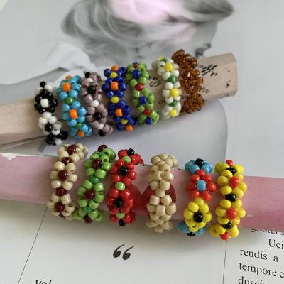 China BOHEMIA weaving handmade small flower Mizhu imported by ring Hyun Yafeng Korean net red IU the same style for sale