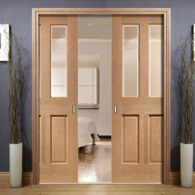 China Sound insulation steel wood plywood laminated finish semi-solid core pocket door for apartment for sale