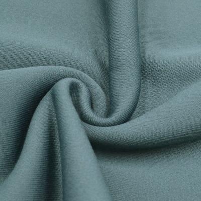 China Anti Pill Knit Back Degradable Brush Polyester Stretch Fleece Fabric for sale