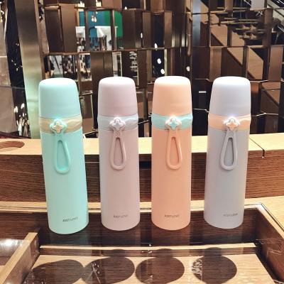 China Viable Korean-style fresh and simple cup of water for boys and girls couples portable one-cover cup flower season thermos dual-use cup for sale