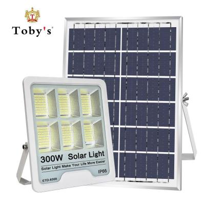 China Toby's 300W 2023 Brand new for shop market rechargeable Outdoor with remote control lamp Solar Flood light 230*60*520mm for sale