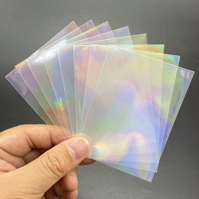 China Custom Wholesale Laser Transparent Clear Sleeves High Quality Rainbow Holographic Protector Trading Cards Sleeve for sale