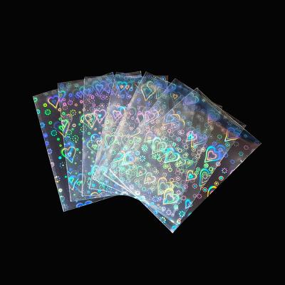 China Hot Sale 500pcs 61x88mm High Quality Clear Holographic Penny Sleeves Collectible Card Sleeves Holographic Protectors for sale