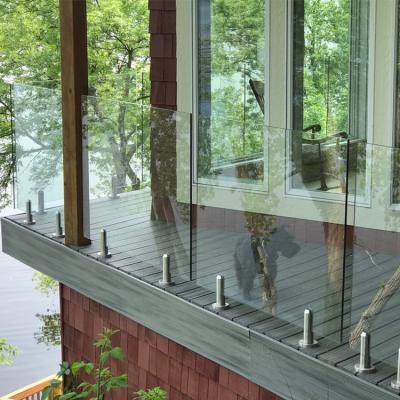 China Modern Tempered Glass Swimming Pool Fencing Frameless Stainless Steel Spindle Glass Railing for sale