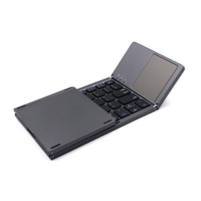 China Hot Sale Wireless Slim Portable Product Mini Pocket Triple Folding BT Keyboard With Touchpad for sale