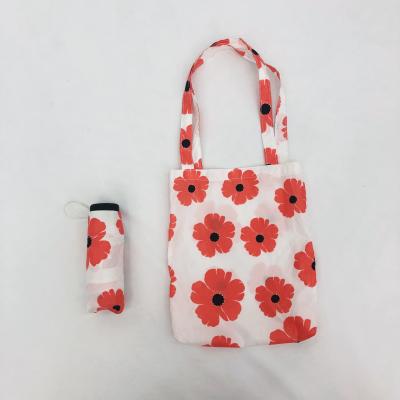 China Hot Sale Folding Flower Print Outside Small Daisy Umbrella Super Tiny Umbrella With Shop Bags for sale