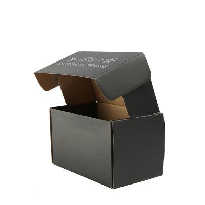 China Recycled Materials Black Super Hard Black Corrugated Paper Packing Box Paper Box Gold Stamping Clothing Ad Corrugated Paper Box for sale