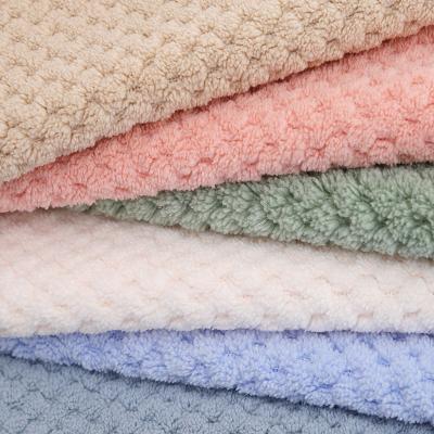 China 100% Sustainable Polyester Double Sided Solid Color Merbau Jacquard Faux Fur Flannel Fabric For Bedding for sale