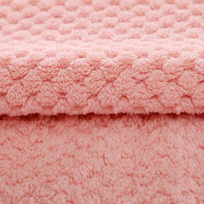 China 100% Sustainable Polyester Double Sided Solid Color Merbau Jacquard Faux Fur Flannel Fabric For Bedding for sale