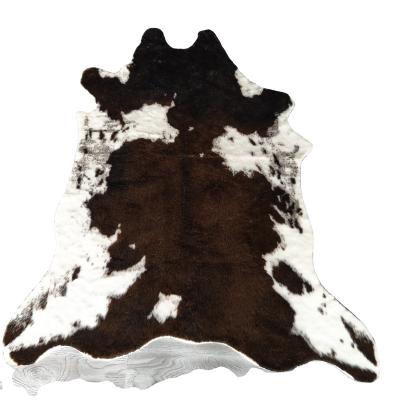 China Manufacturer Selling Super Soft Anti-slip Custom Shape Cute Animal Shape Print Cowhide Faux Fur Blanket Rug For Home Textiles for sale