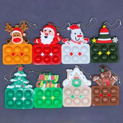 China New PVC Christmas Cartoon Decompression Squeeze Bubble Pendant Decoration Key Chain for sale