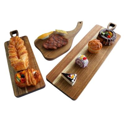 China Viable wholesale wooden cutting board with handle for sale