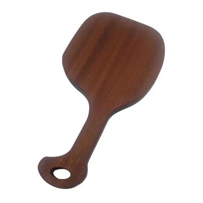 China Sustainable New Household Necessities Small Sapele Wood Cutting Board With Twisted Handle Round Hole for sale