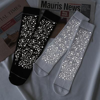 China Breathable Hot Popular Black Unisex Crew Star Cotton Selling Reflective Socks for sale