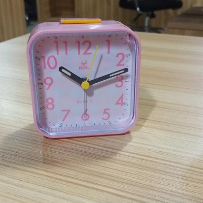 China Insurance Customization Promotion Gift ABS Battery Operated Analog Alarm Clock Silent Non Tick Growing Sounds Doze Light Pink for sale