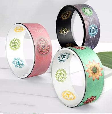 China Professional PU+PP Color Draw Yoga Wheel Bare Back Artifact Beginner Stovepipe Yoga Ring Pilates Circle Yoga Wheel Bending Wheel for sale