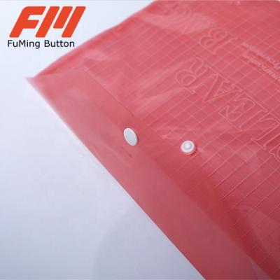 China Other FM Bags Buttons Round Shape Embossed Buttons For Clothes Stationery Buttons for sale