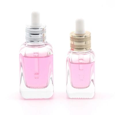 China Square 10ml 20ml 40ml Glass Essential Oil Perfume Bottle Square 10ml 20ml 40ml Recyclable Clear Glass Cosmetic Bottle Serum Dropper Bottle for sale