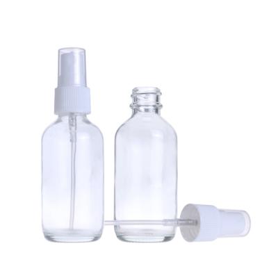 China Wholesale 60ml 2oz Eco-friendly Recyclable Clear Round Empty Sanitizer Boston Glass Cosmetic Sprayer Bottle for sale