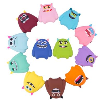 China Classic kinds of monster shape silicon zipper coin purse silica gel coin pouch waterproof silicone cartoon money bag for sale