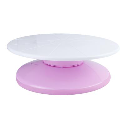 China Sustainable Removable White Pink Plastic Cake Turntable Stand Holder For Cake Decorating for sale