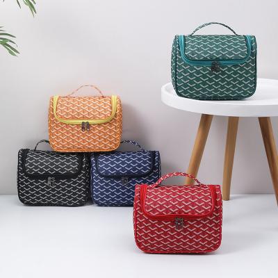 China Durable Waterproof Travel Toiletry Bag Large Capacity PU Storage Portable Cosmetic Bag For Business Trip for sale